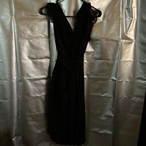 Little Black Dress. Lace v neck. V back. Pleated. Lace sleeves